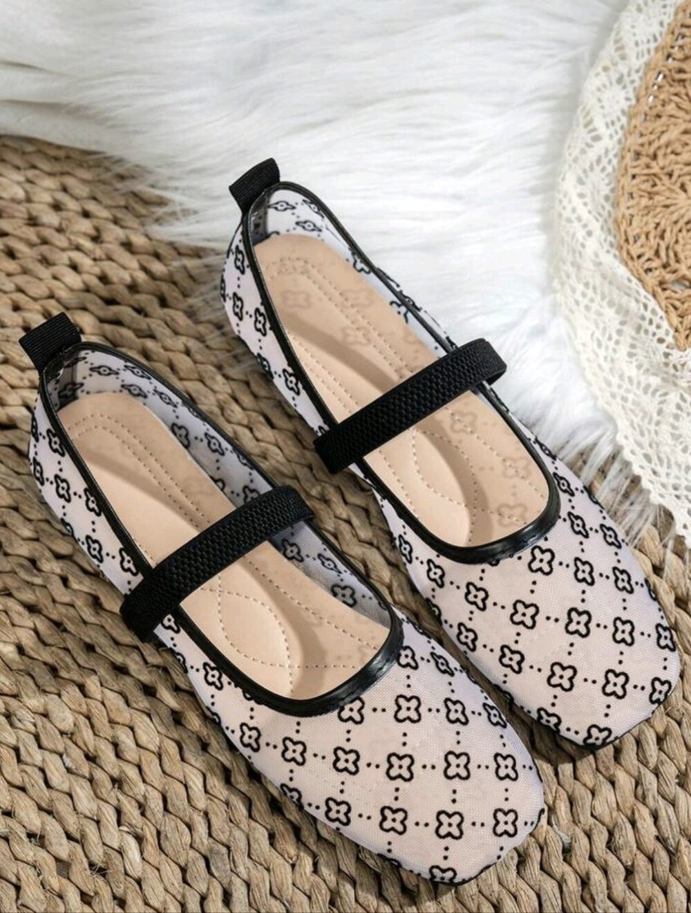 Mary Jabe Black-Trim Clover Patterned Flats.